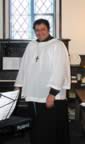 St. John's organist (28kb)