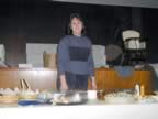 One of the parishioners who helped put on the spread (23kb)