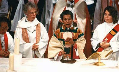 Barbara Harris celebrating the Eucharist at her consecration.